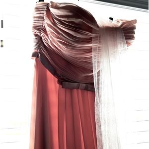 Formal dress used once. Tailored for a 5’ 1” height dress.